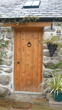 Example of a bespoke wooden exterior door from Kevin Lench
